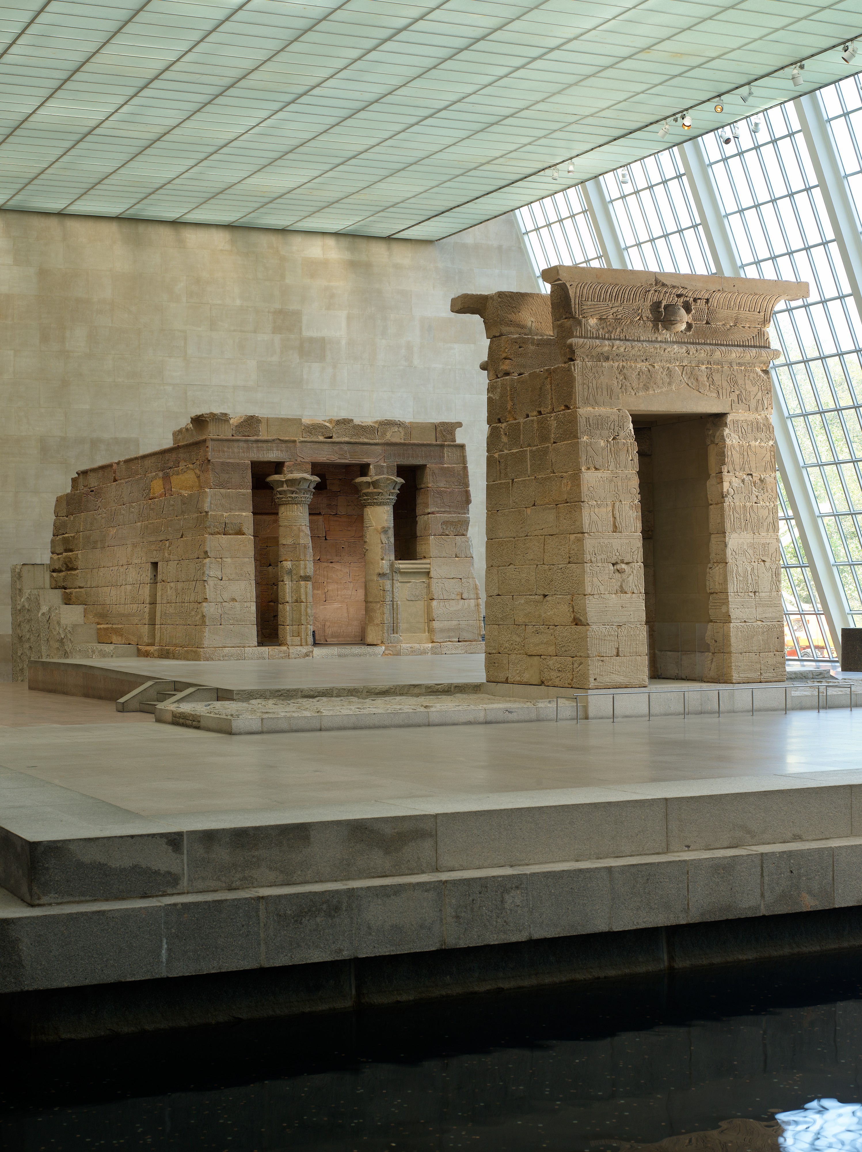 The sandstone Temple of Dendur displayed in a museum gallery.